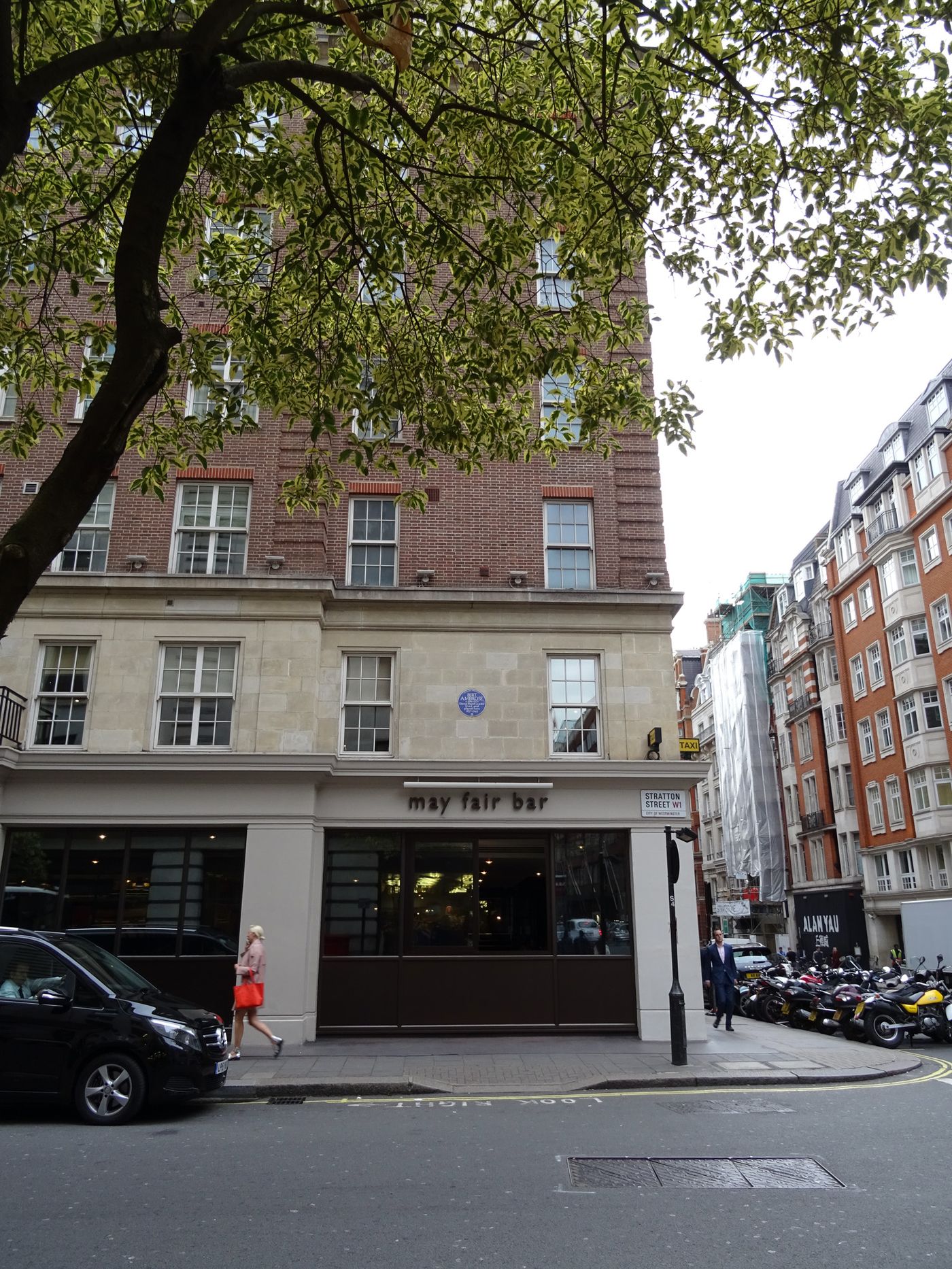 Historic plaque referencing The May Fair Hotel on Stratton Street